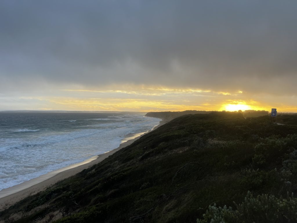 Golden sunset over the beach and dunes at Ocean Grove, minutes from the accommodation